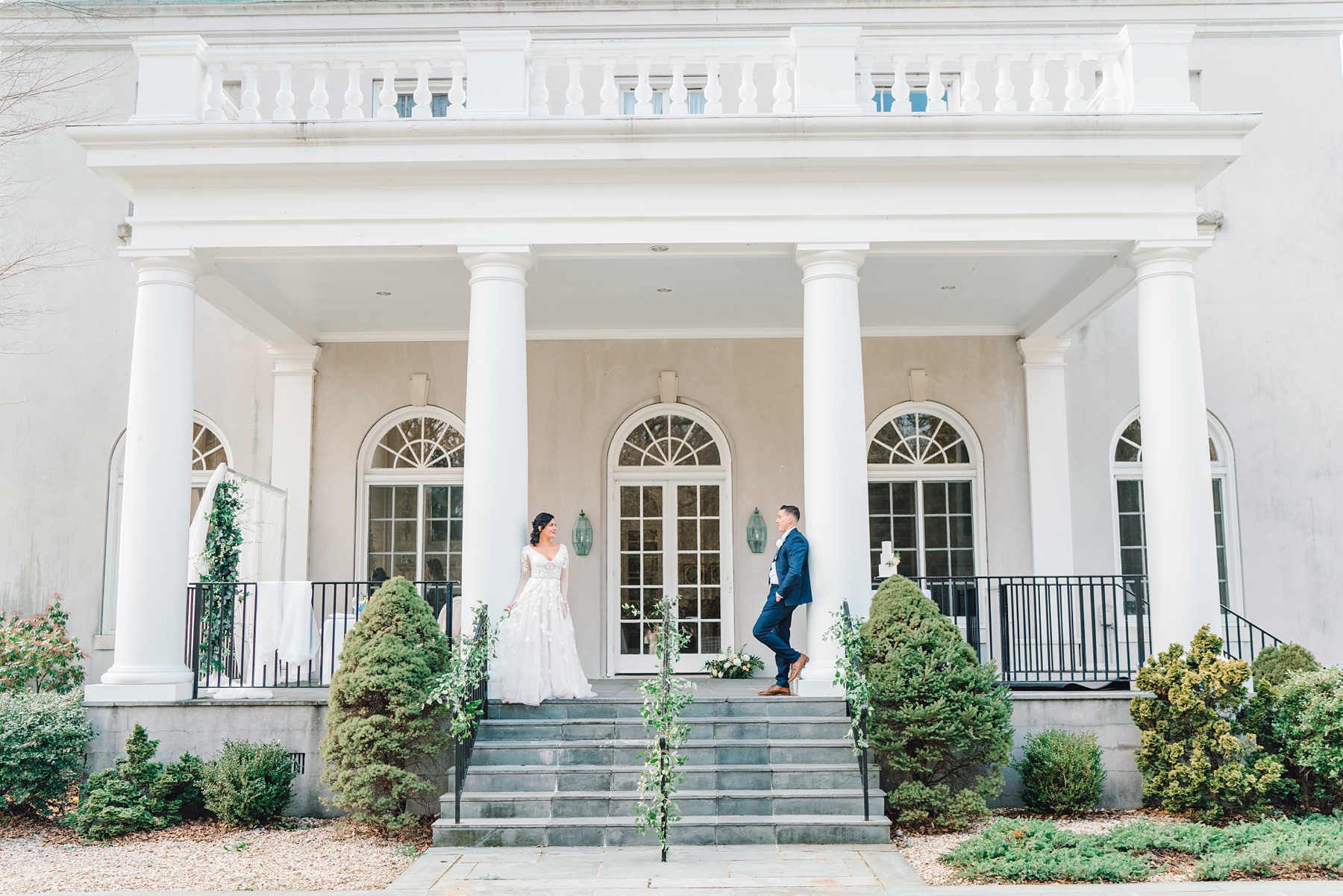 Couple standing in front of Strong Mansion in Maryland