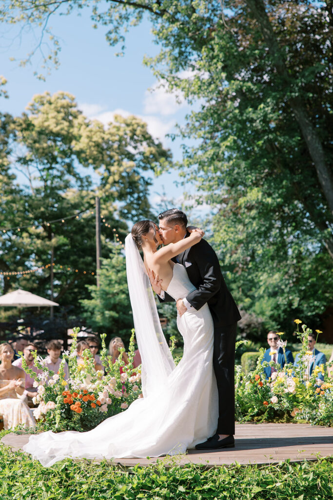 Ceremony kiss at The Cypress House