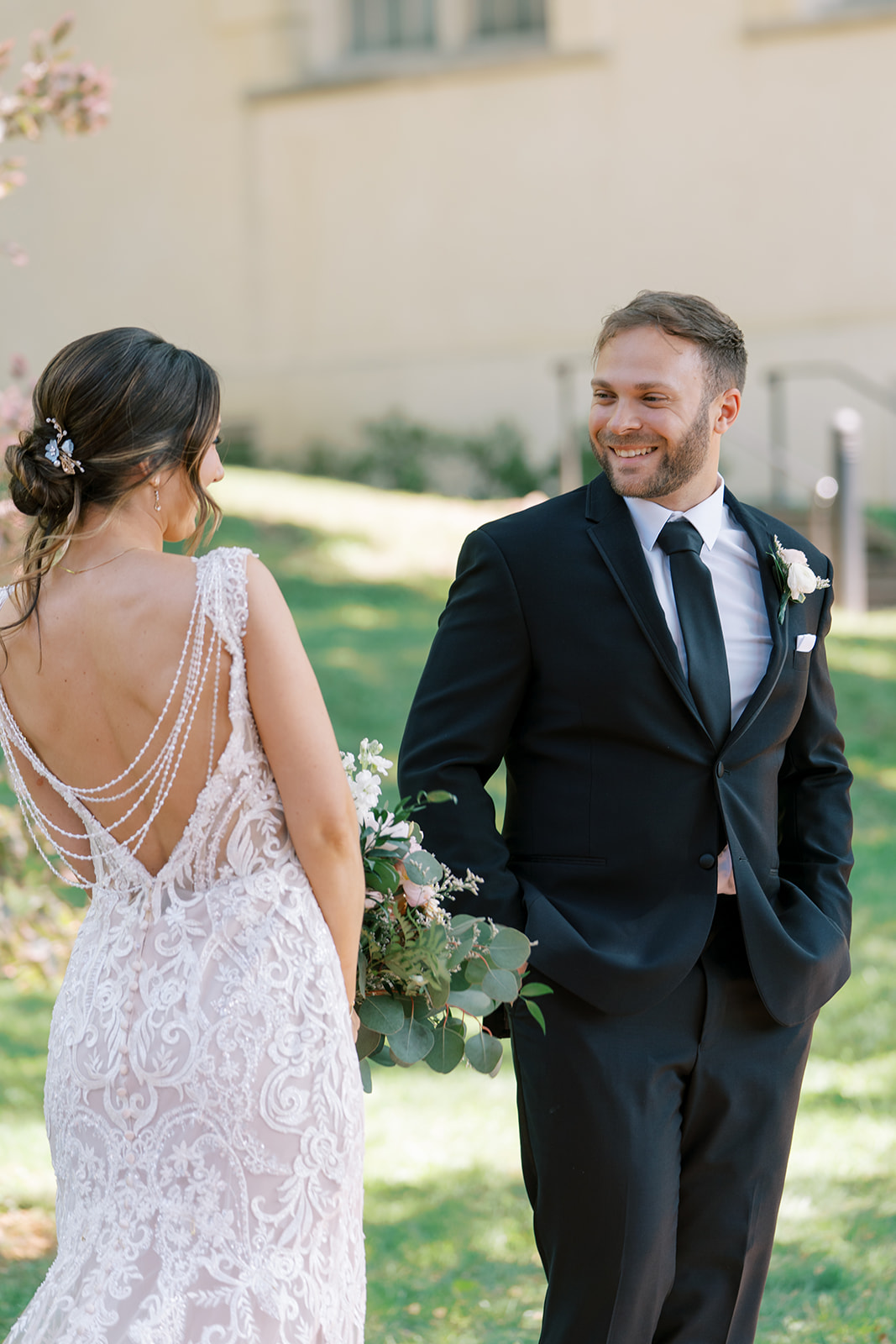 bride and groom having a first look