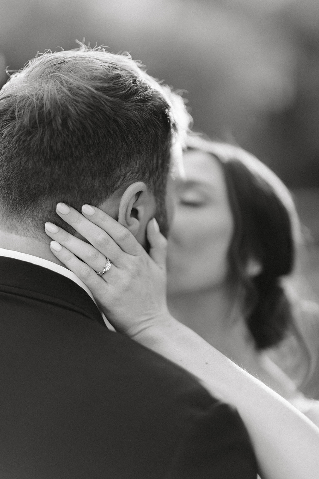 bride and groom kissing